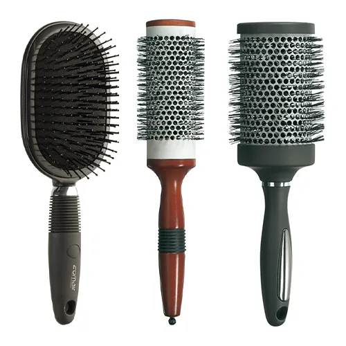 Eine Paddle Brush und zwei Rundbürsten in unterschiedlichen Größen.